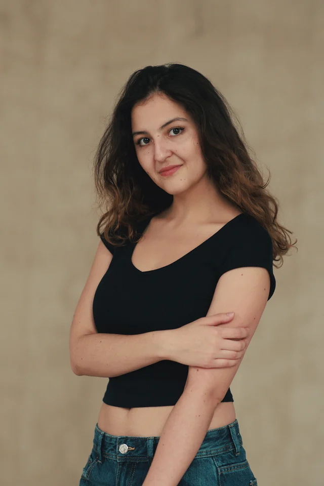 Tomi — studio headshot